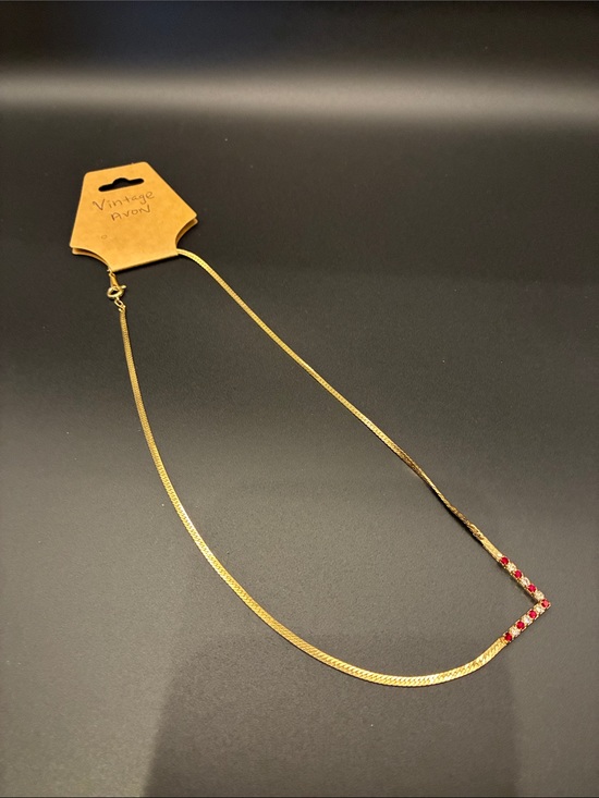 Avon Jewelry - Avon Gold Tone Necklace with Red Crystal Row